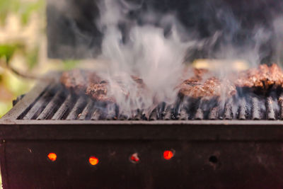 Close-up of bonfire on barbecue grill