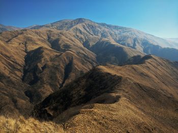 Scenic view of mountains against clear sky