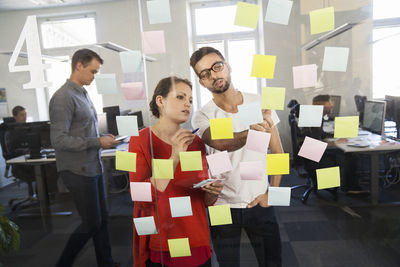 People in office with post-its