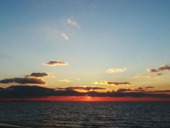 Scenic view of sea at sunset