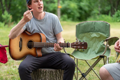 Young man playing guitar