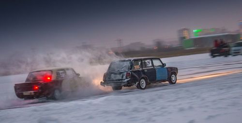 Vehicles on road in winter