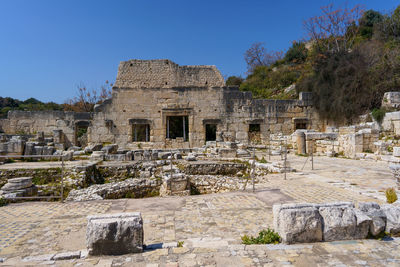 Old ruins against clear blue sky