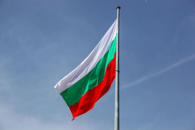 Low angle view of flag against sky