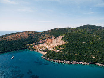 High angle view of bay against sky