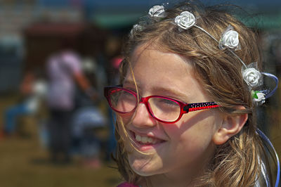 Close-up of smiling girl wearing tiara