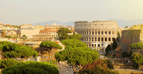 Ancient rome with coliseum and roman forum famous travel destinations of italy.