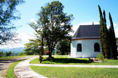 View of building with trees in foreground