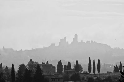 Buildings in city against sky