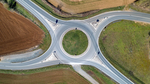 High angle view of road amidst trees