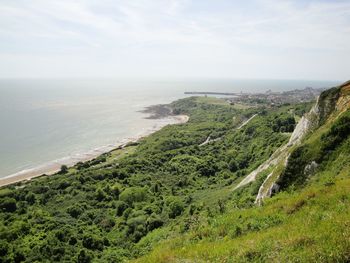 Scenic view of beach and sea against sky