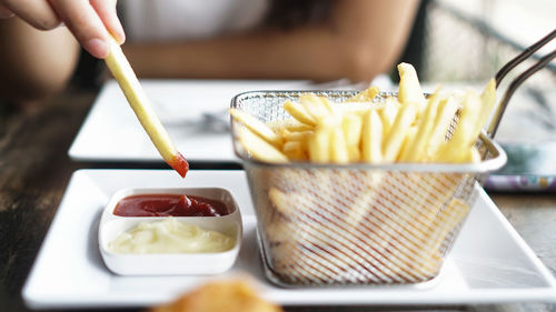 Close-up of person preparing food