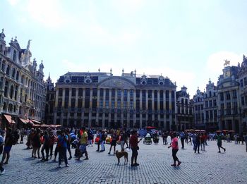 Tourists in front of building