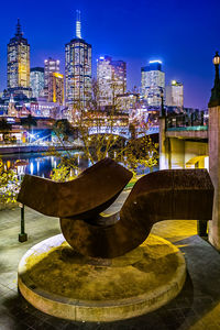 Illuminated sculpture of city at night