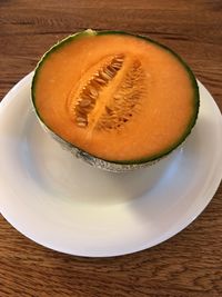 High angle view of fruit in plate on table