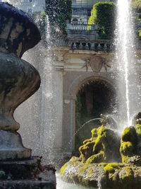 Fountain in front of historical building