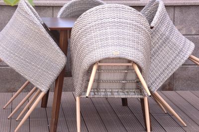 High angle view of empty chairs and table in cafe