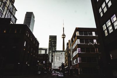 Low angle view of skyscrapers against sky in city