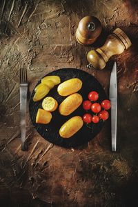 High angle view of fruits in container on table