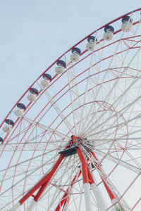 Low angle view of ferris wheel against sky