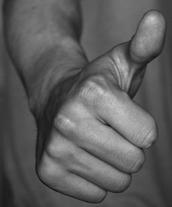 Hand indicating thumbs up