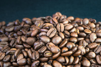 Close-up of coffee beans on table