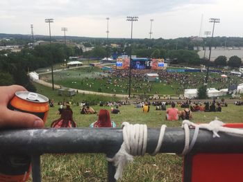 People on field against sky