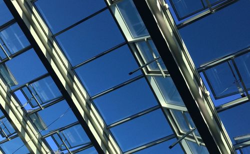 Low angle view of building against blue sky