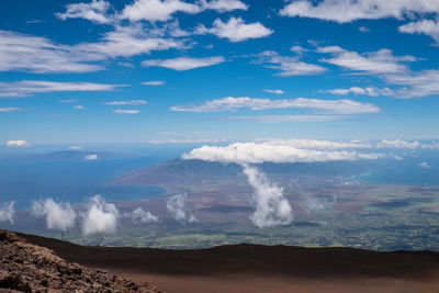 Scenic view of volcanic landscape against sky