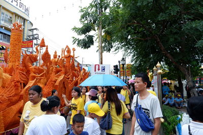 People standing on street in city