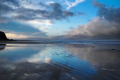 Scenic view of sea against sky during sunset