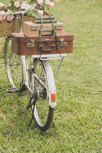 Bicycle in basket on field