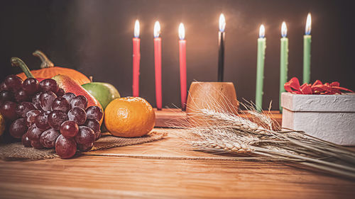 Close-up of candles on table