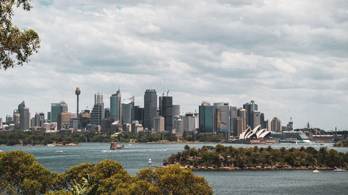 Sydney city building skyline with an island in foreground 