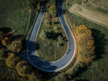 High angle view of tire tracks on road