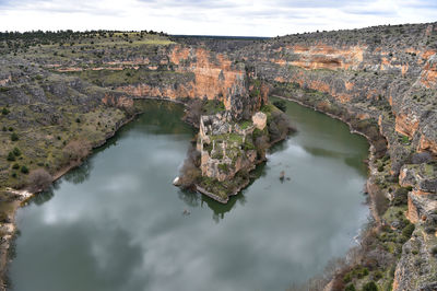 High angle view of water flowing through rocks