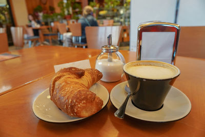 Close-up of breakfast served on table