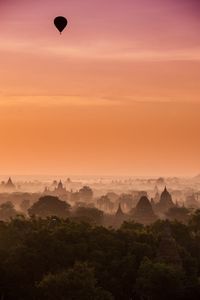 Scenic view of landscape against sky during sunset