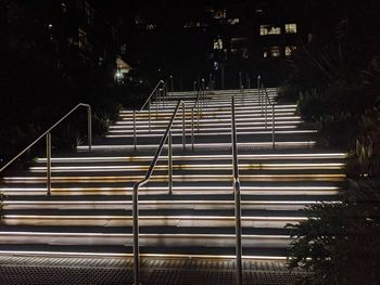 High angle view of illuminated staircase at night