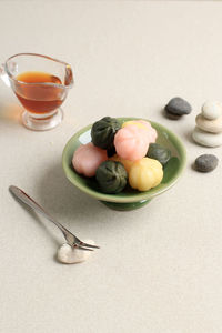 Three color songpyeon kkultteok rice cake with honey filling