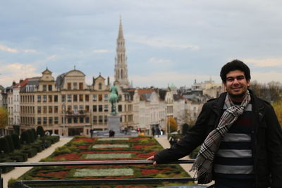 Portrait of man standing against mont des arts