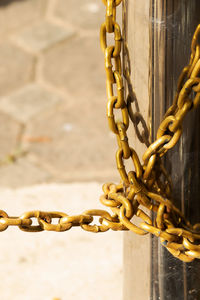 Close-up of padlock on chain