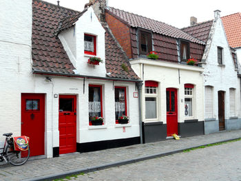 Residential buildings by street in city