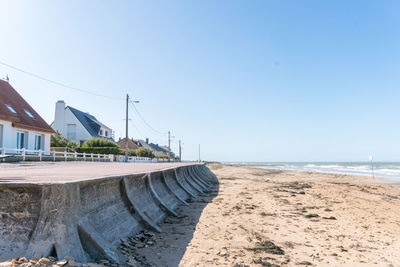 Scenic view of beach against clear sky