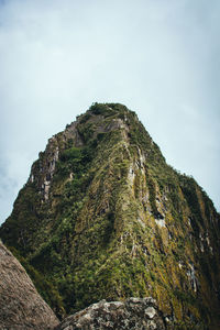 Scenic view of cliff against sky