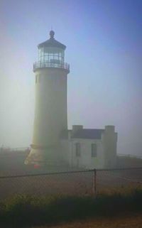 View of lighthouse in foggy weather