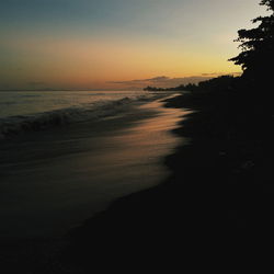 Scenic view of sea at sunset