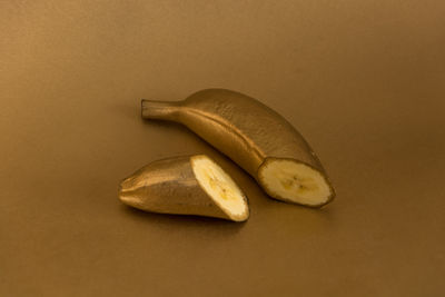 Close-up of bananas against white background