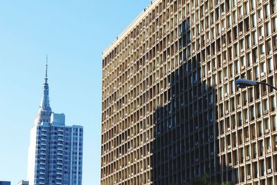 Low angle view of skyscrapers against sky