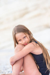 Portrait of a smiling girl on beach